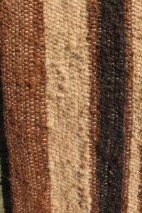 rug brown fawn black closeup